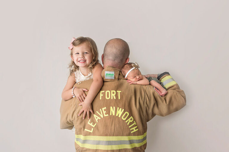 Kansas City Newborn Photographer firefighter sibling pose