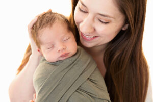 kansas city newborn photographer Susy Photo with baby Oren his session is a grey and green inspiratoin