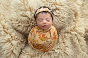 sleeping baby Kansas City newborn photographer when to book your newborn session
